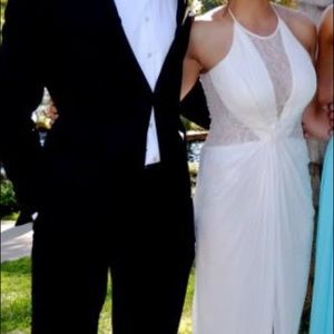 White full length gown with mesh insets.